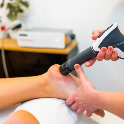 Shockwave soundwave therapy treatment performed after a car accident